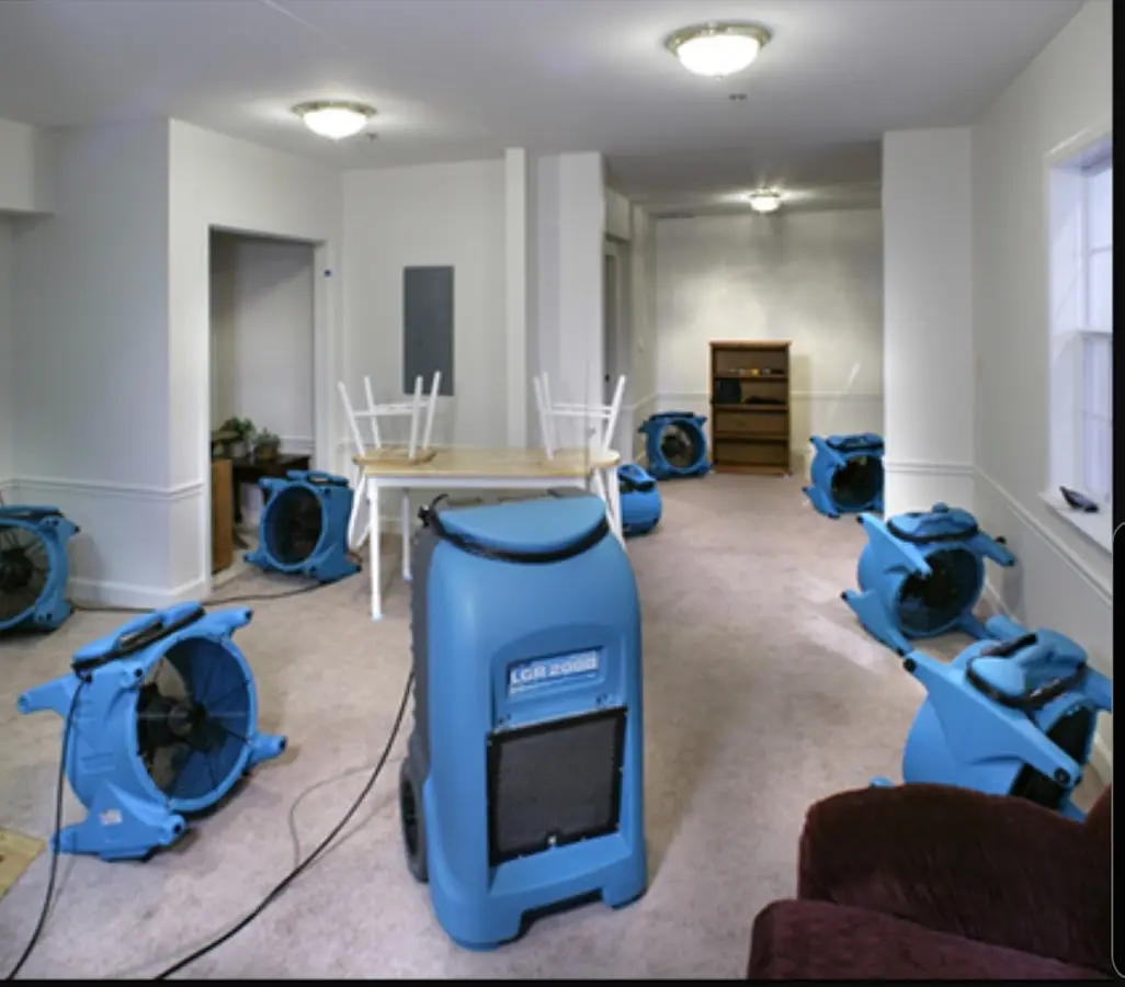 Air movers and dehumidifier setup for Water Damage Restoration in West Vero Corridor